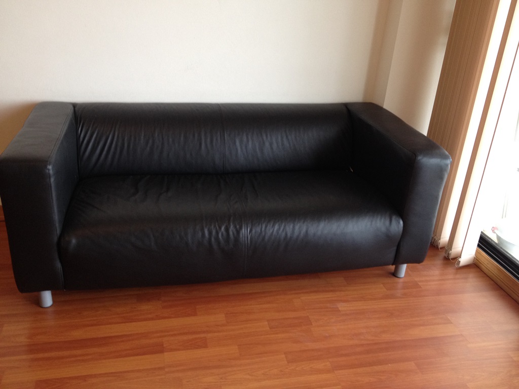 Used Ikea Klippan 2 seat leather sofa. Black colour